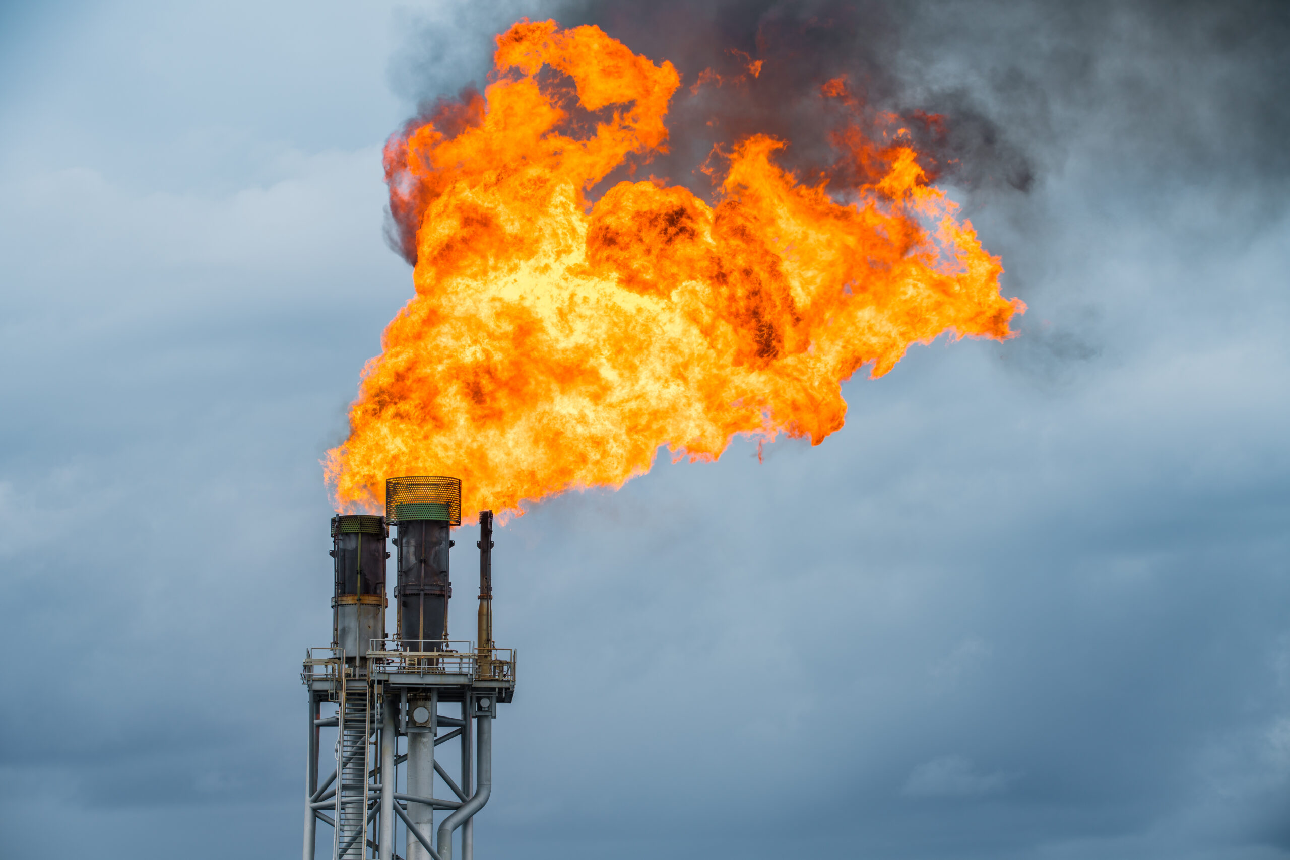 Fire on flare at oil and gas central processing platform 