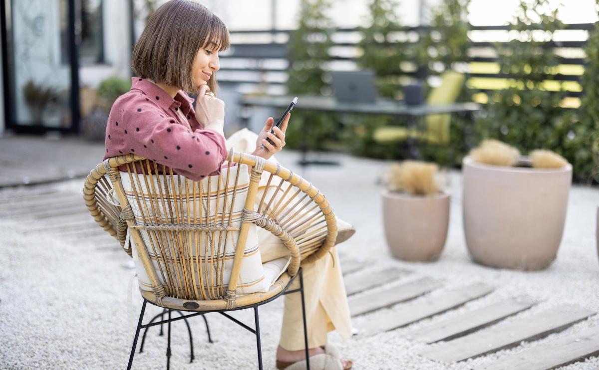 Woman using her smartphone outdoors