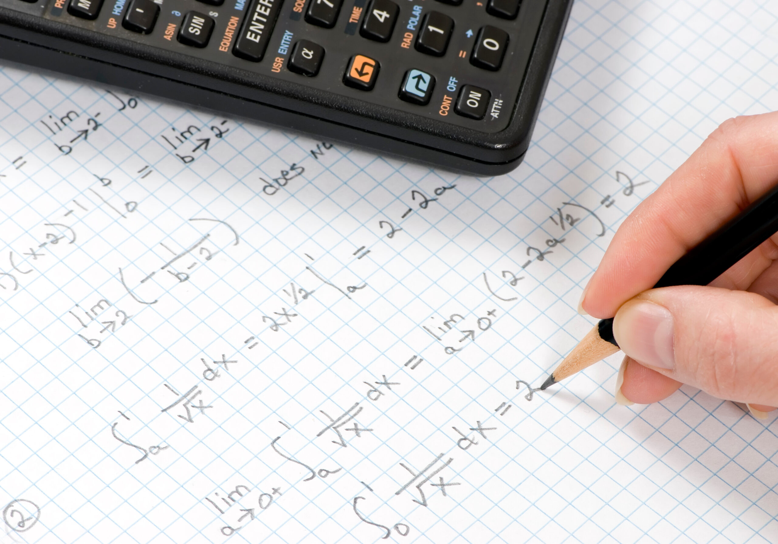 A student finishes the solution to a Calculus problem