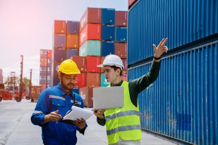 Logistics management checking and inspecting goods in container