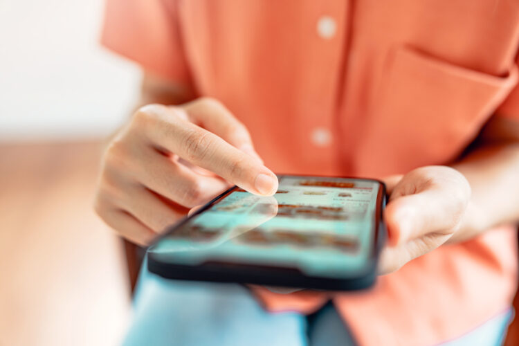 Woman browsing online store with wide variety of products available