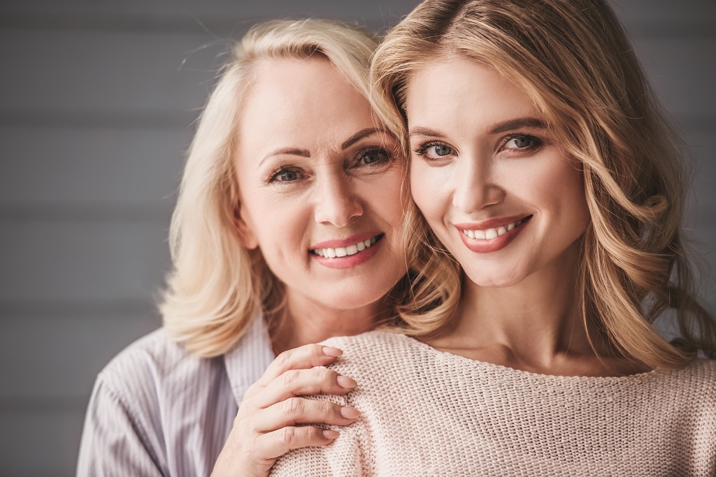 Good-looking senior mum and adult daughter.