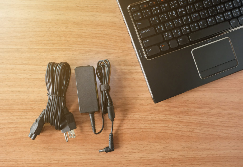 Adapter and power charger of a laptop.