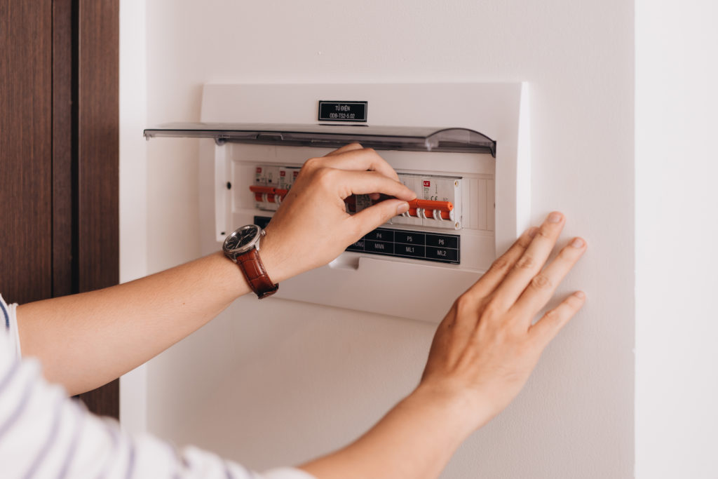 Circuit breaker board displays many switches.