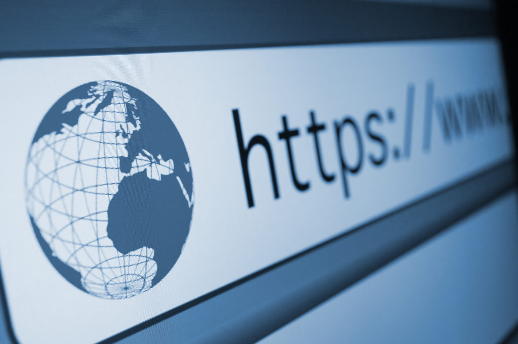 Closeup of a computer screen with an address bar of a web browser.