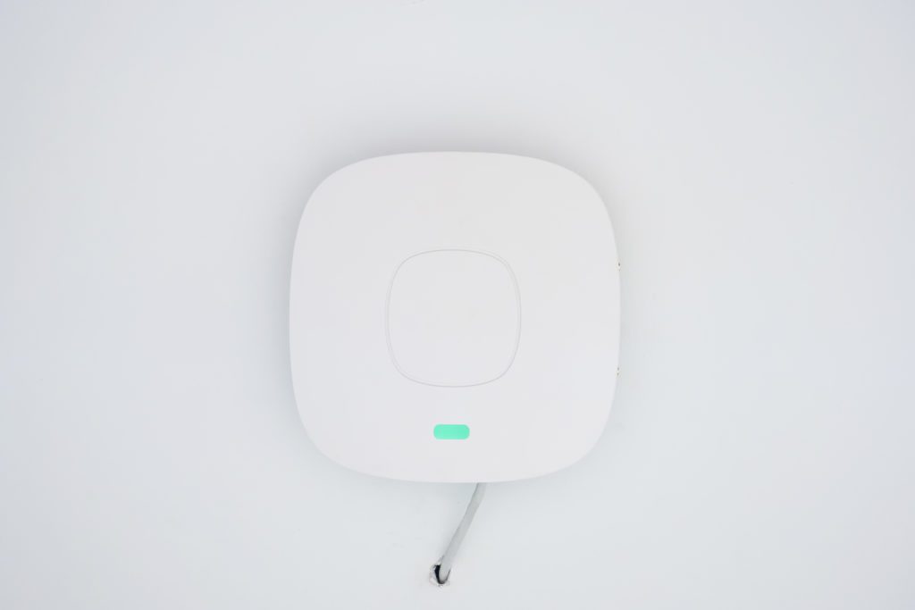 White ceiling access point wifi.