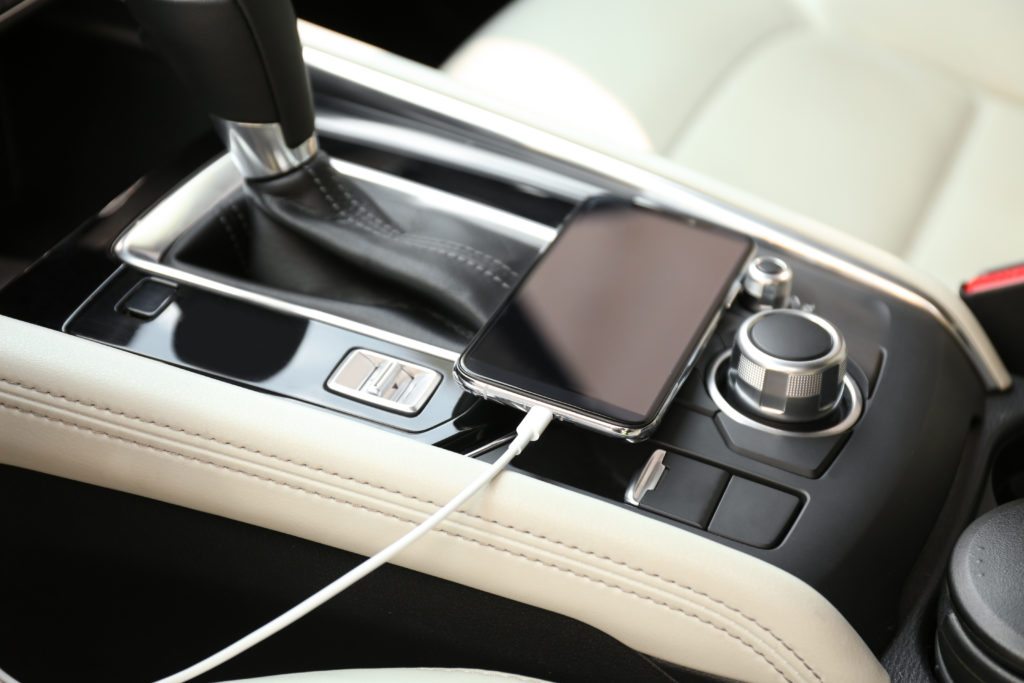 Mobile phone charging in the car.