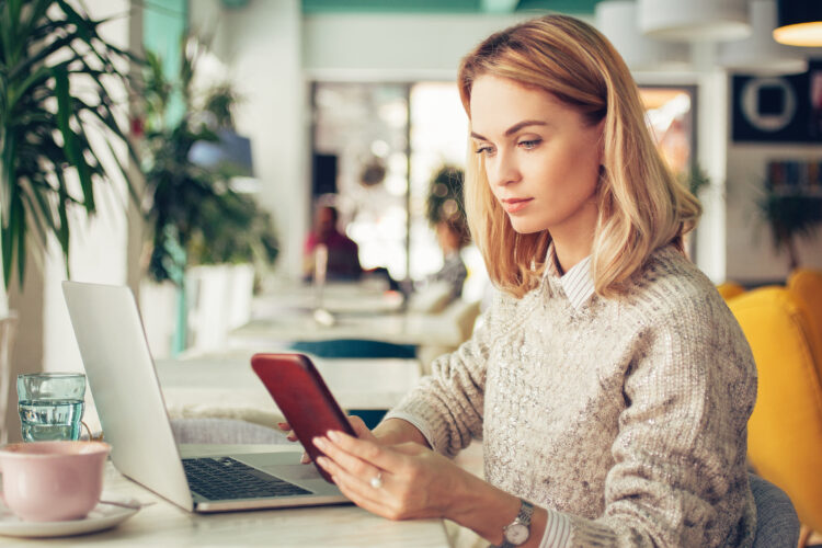 busy woman using phone in the office 