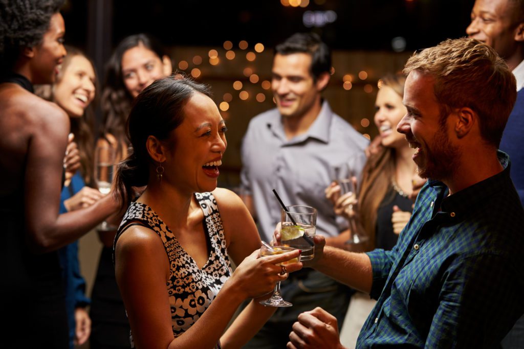 Couple dancing and enjoying at an evening party.
