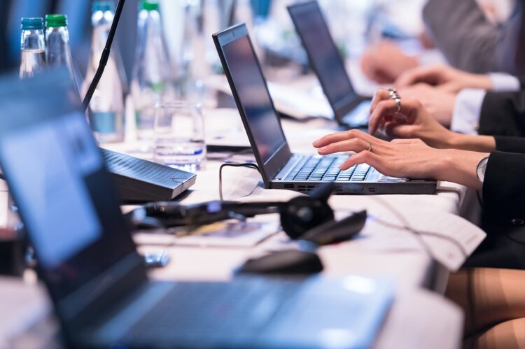 people hands using laptop computer