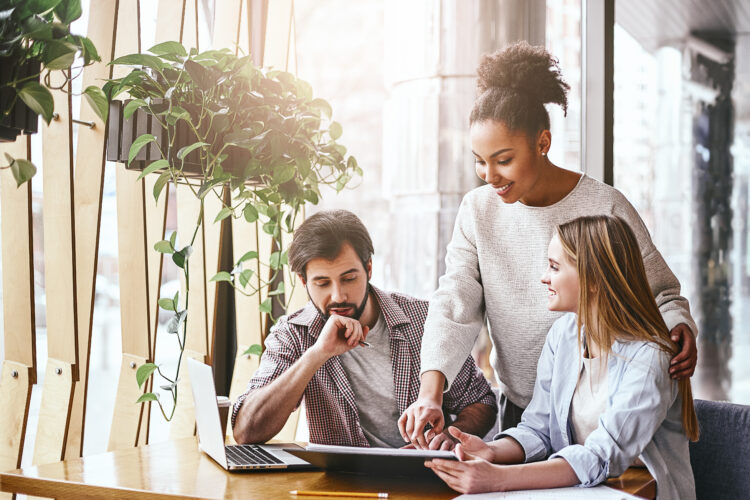 millennial colleagues discussing company briefing in office,brainstorming, developing success strategies