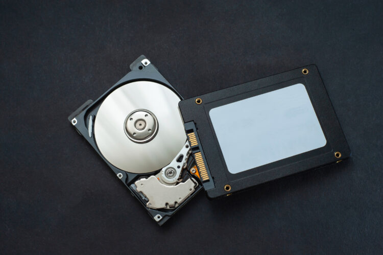 HDD head resting on a disk platter and its reflection
