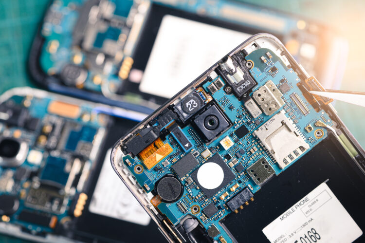 The inside of the smartphone's motherboard and sim card 