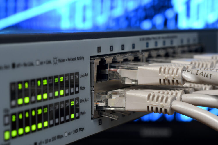 Lan cables Rj45 and lights on network switches. 