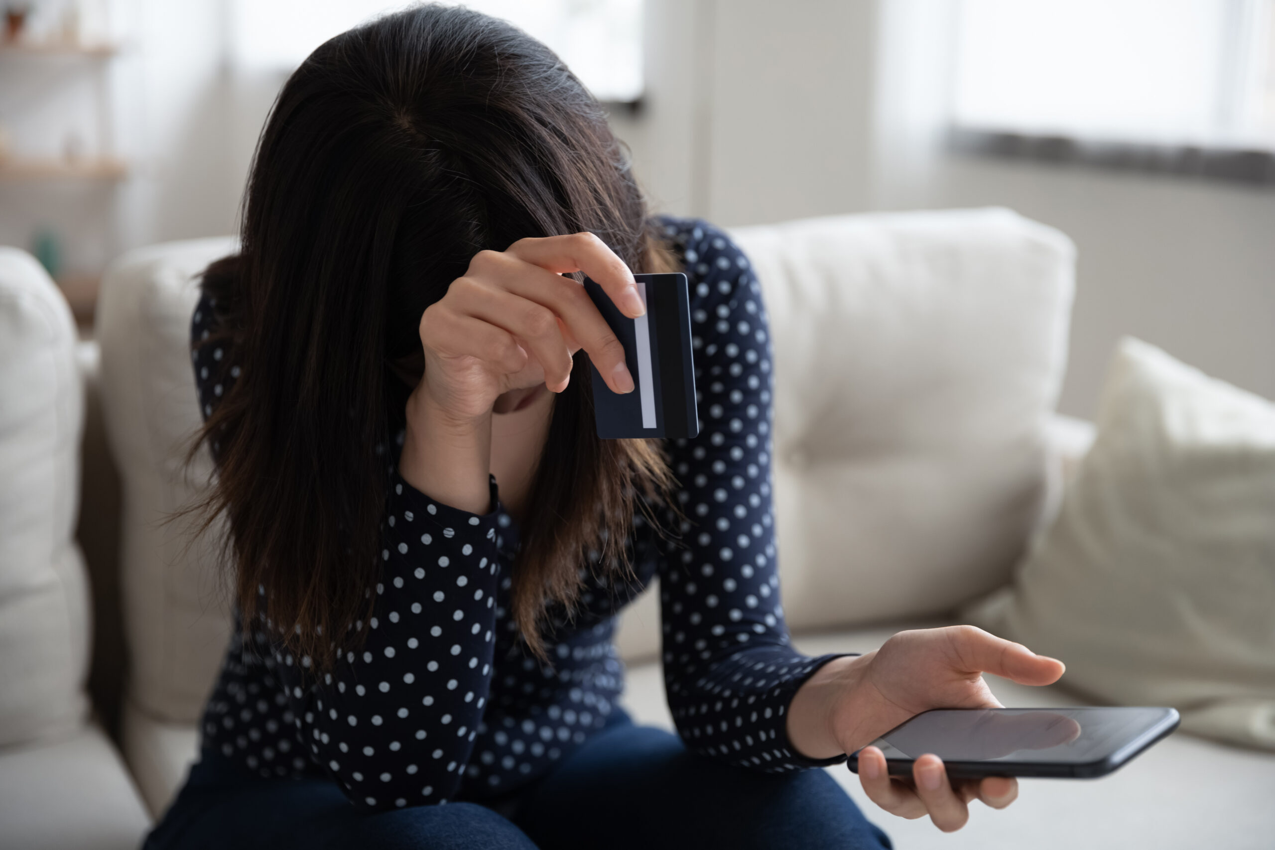 Unhappy woman have problems paying online with credit card