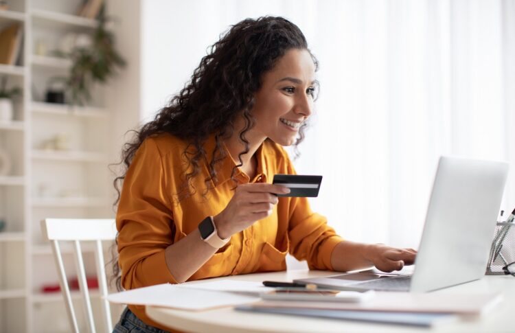 excited woman shops online