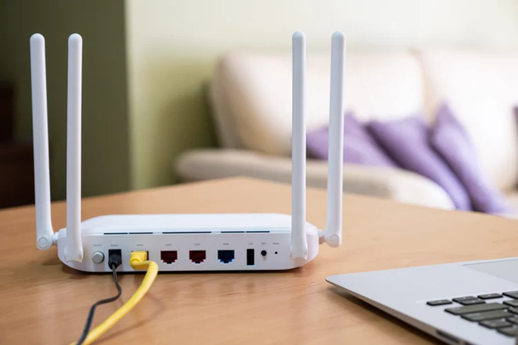 internet router on working table with laptop