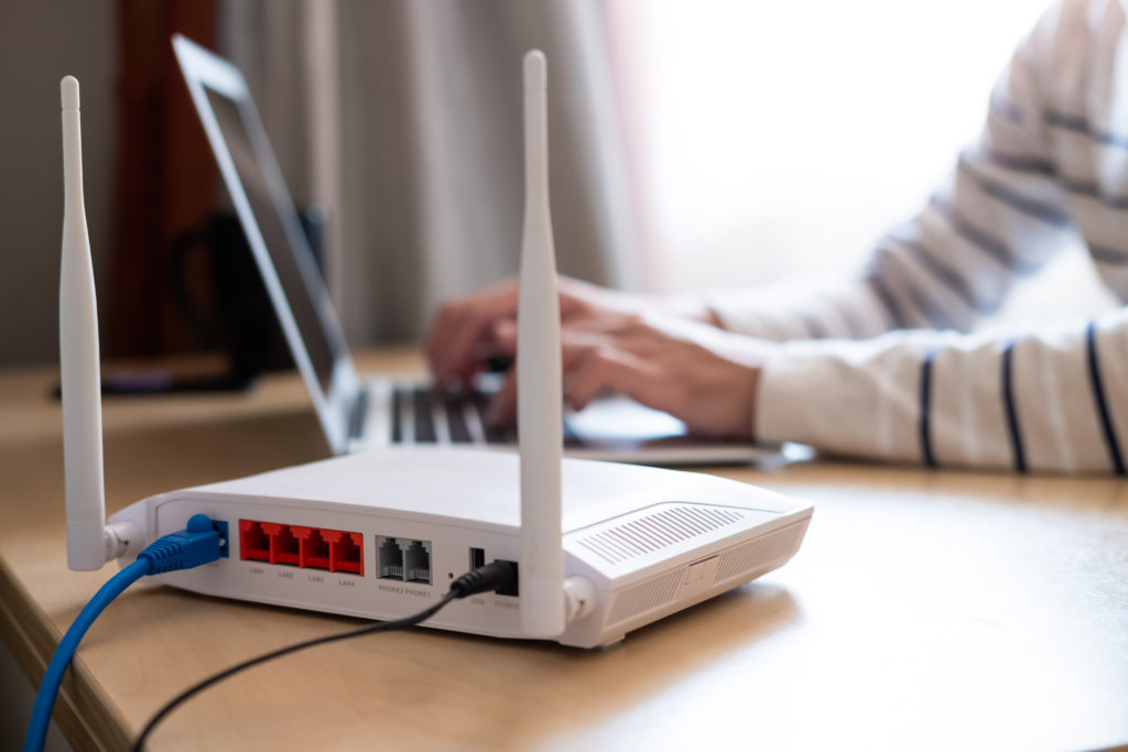 Laptop connected to a wifi router.