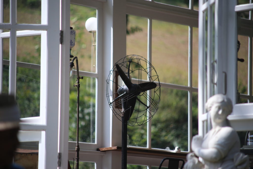 Old fan by the window.