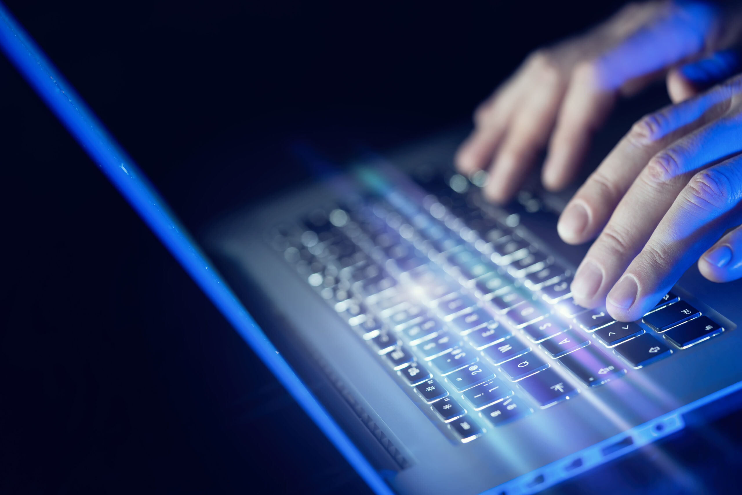 male hands typing on the laptop 