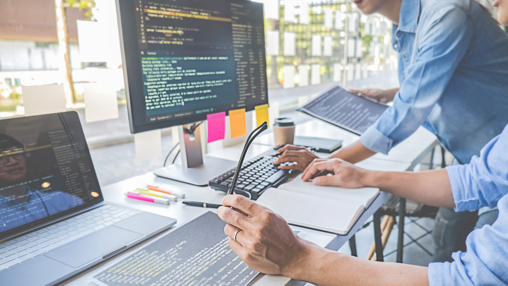 Programmer working in a software development and coding technologies. Website design. Technology concept.