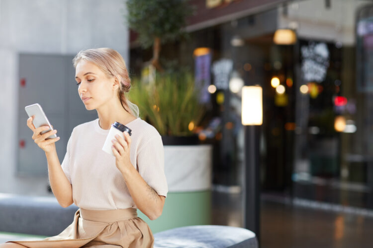 woman using internet on phone