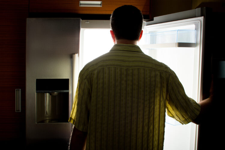 Bachelor Looking For Food in a Fridge