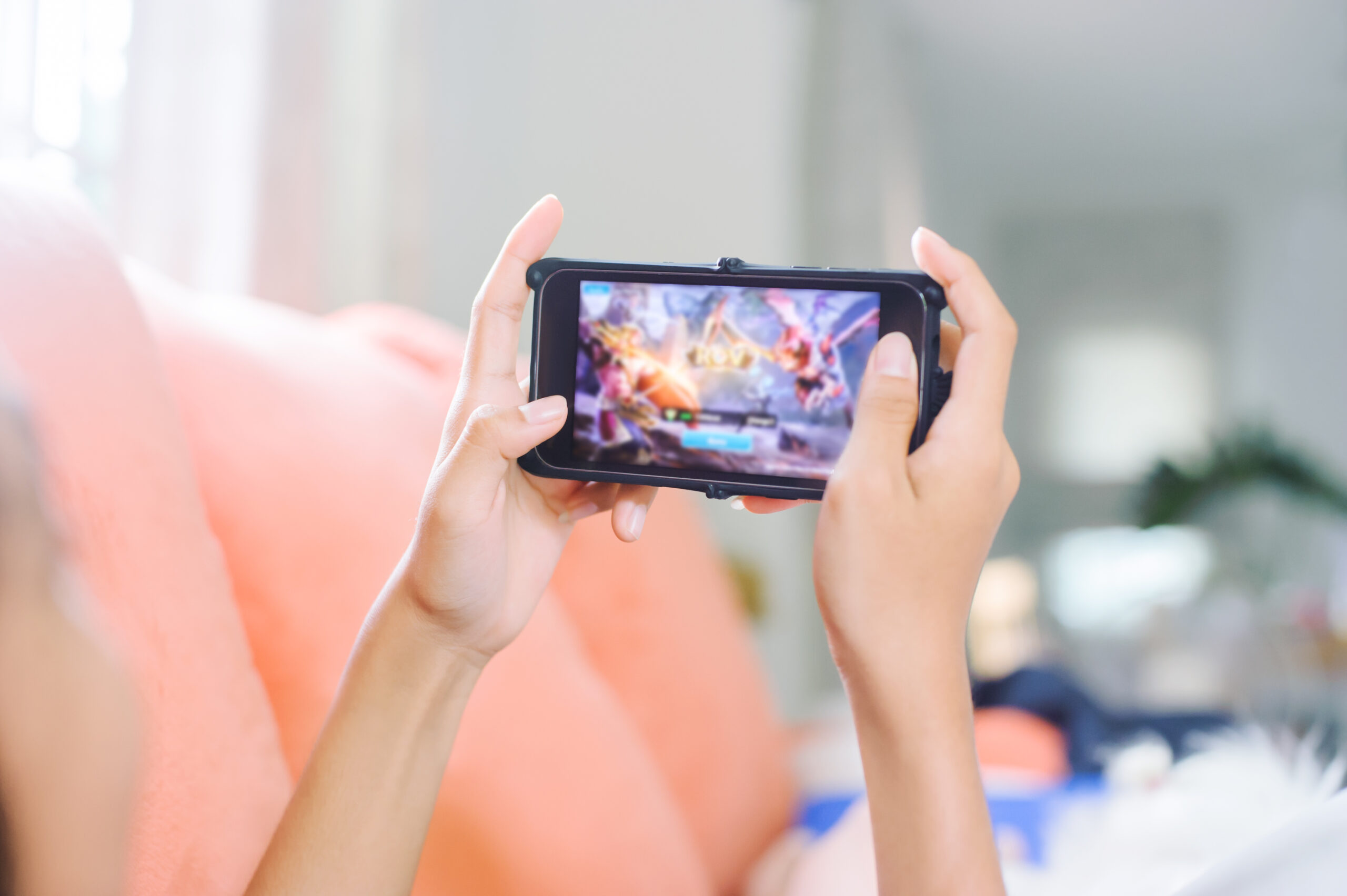 young girl playing games online at home