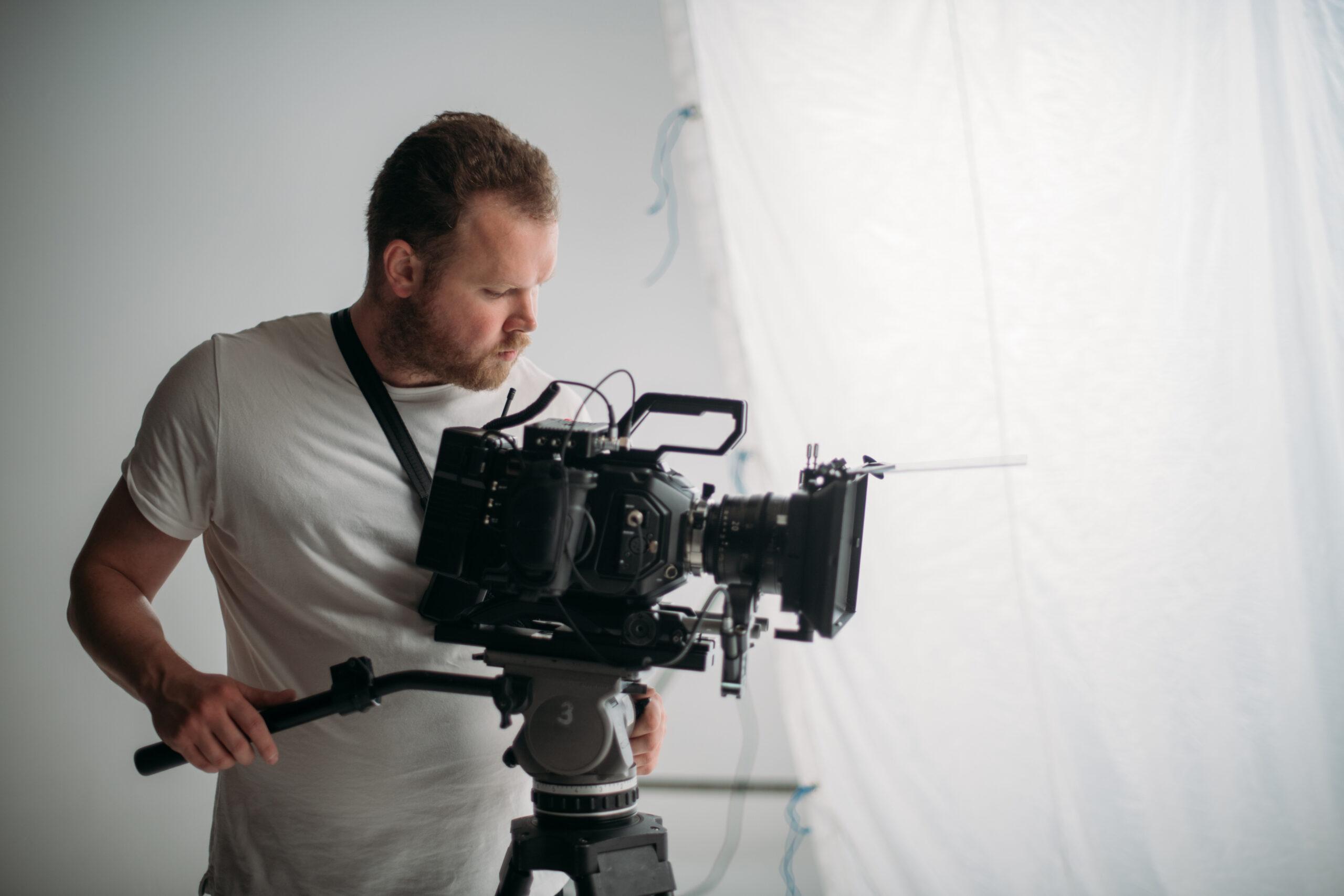 Director of photography with a camera in his hands on the set. P