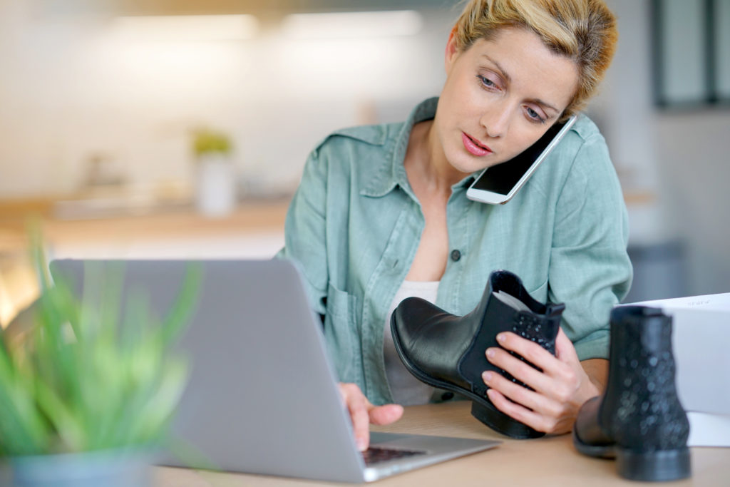 Woman on the phone with customer service department