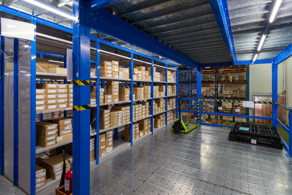 Interior of warehouse with racks and shelves