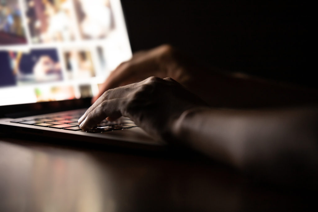 Man using a laptop computer.