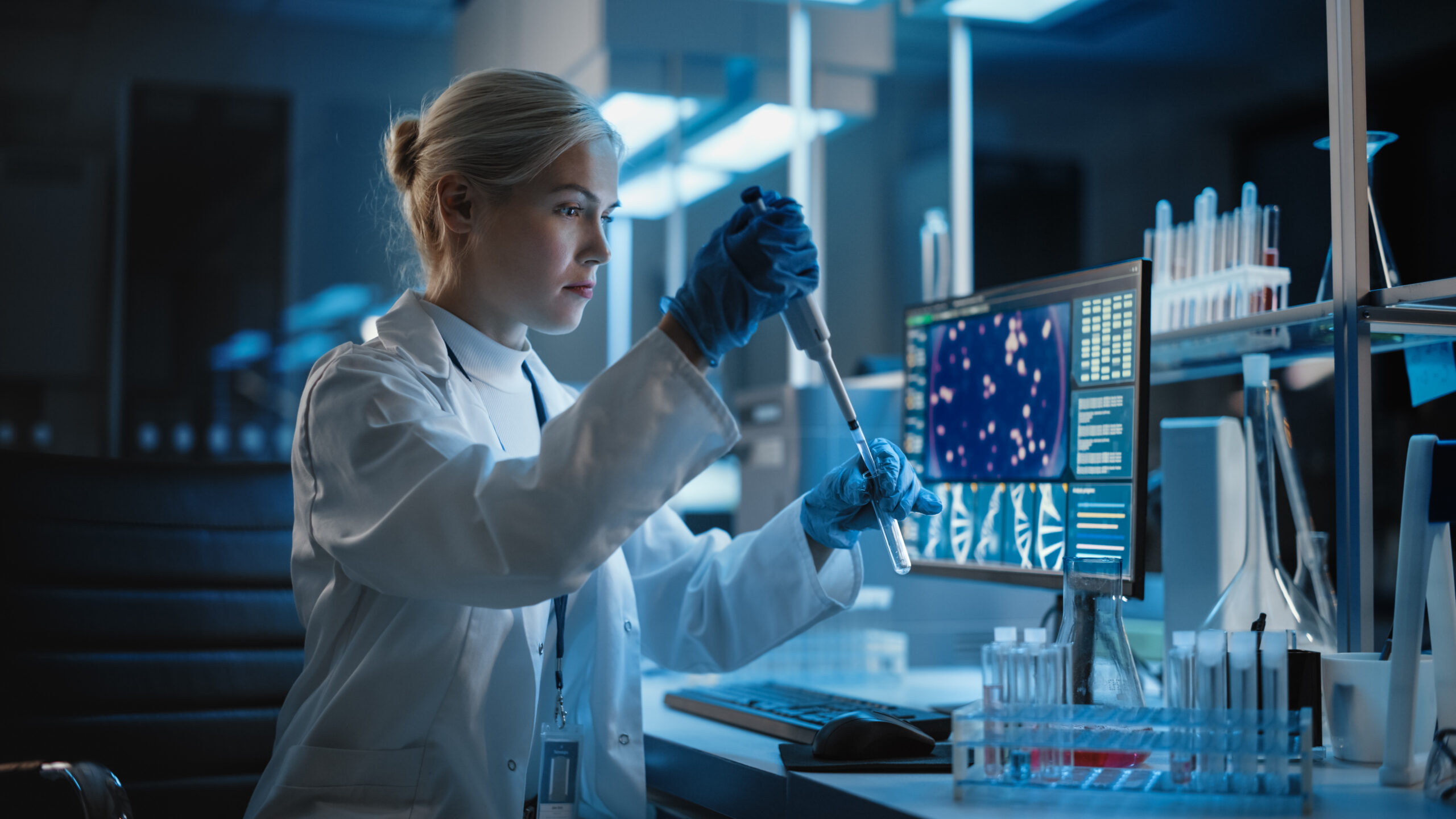 in medical research lab, female scientist working with samples