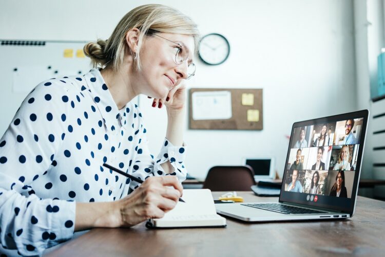 Smiling woman on a video conference call