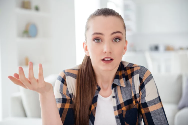 Terrified female student whiel having an online lesson.