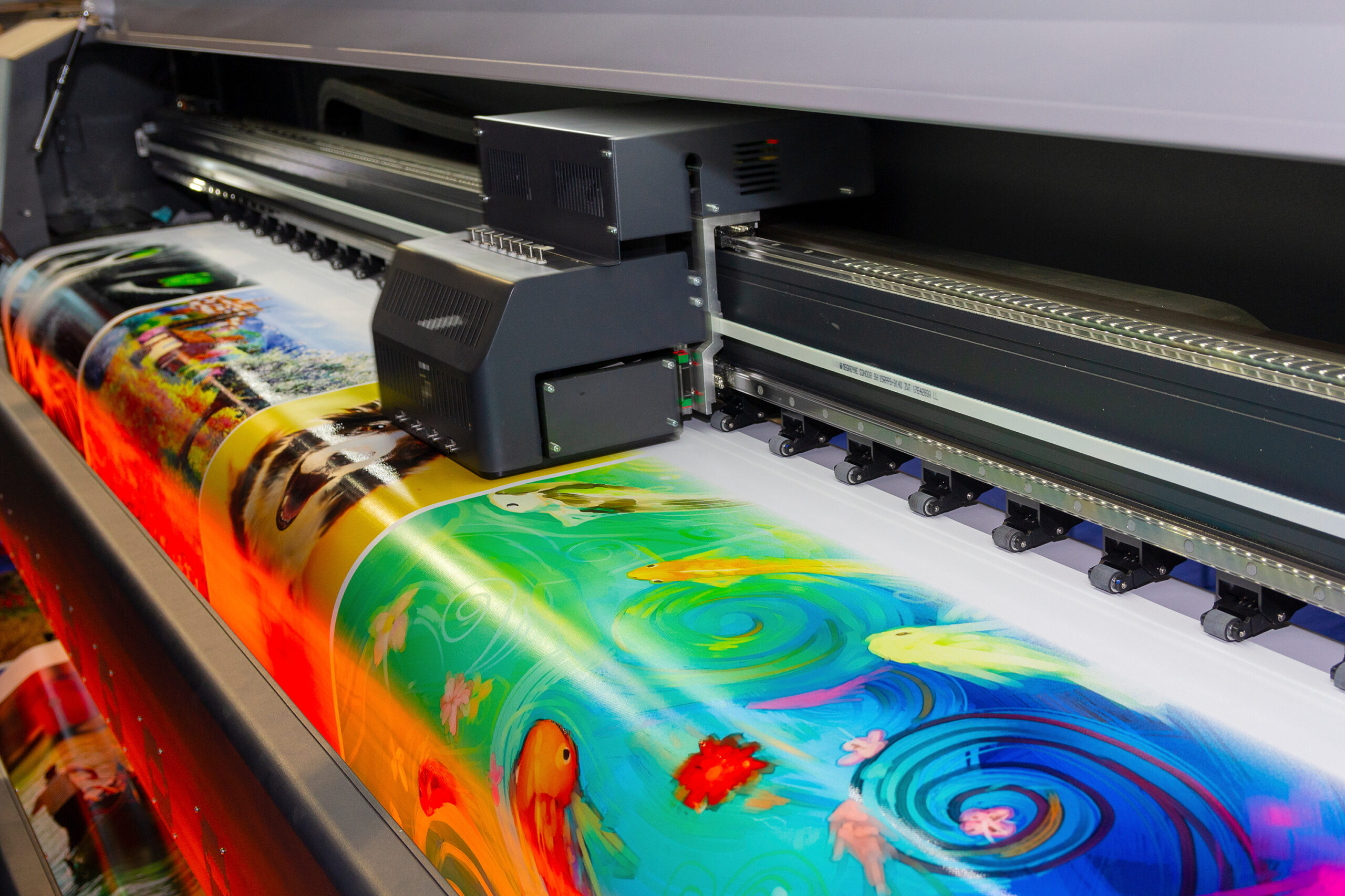 Large format printing machine in operation. Industry