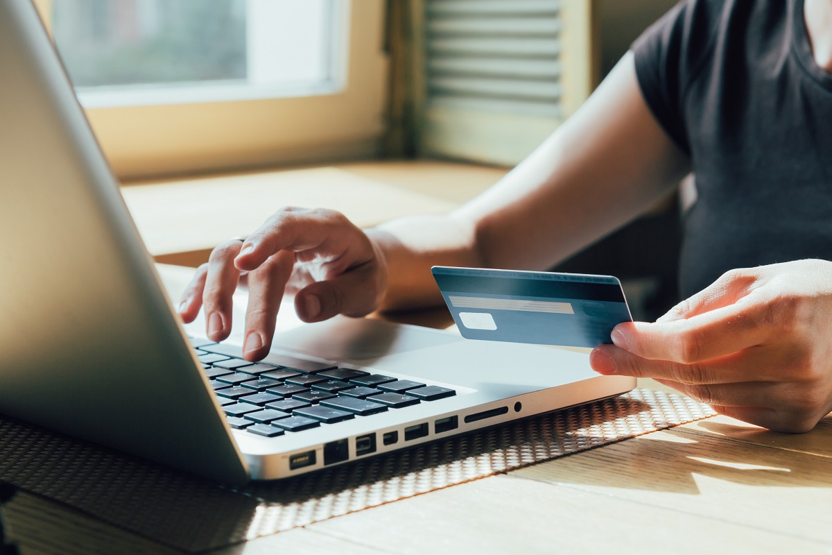 woman is shopping on the Internet using credit card