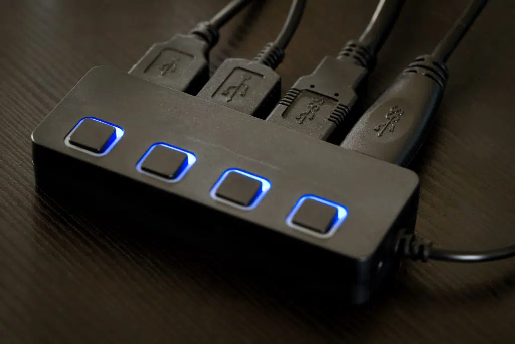 Black USB hub in use