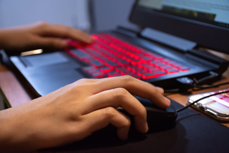 woman hands using laptop computer