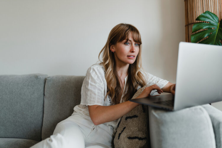 woman working on laptop at home