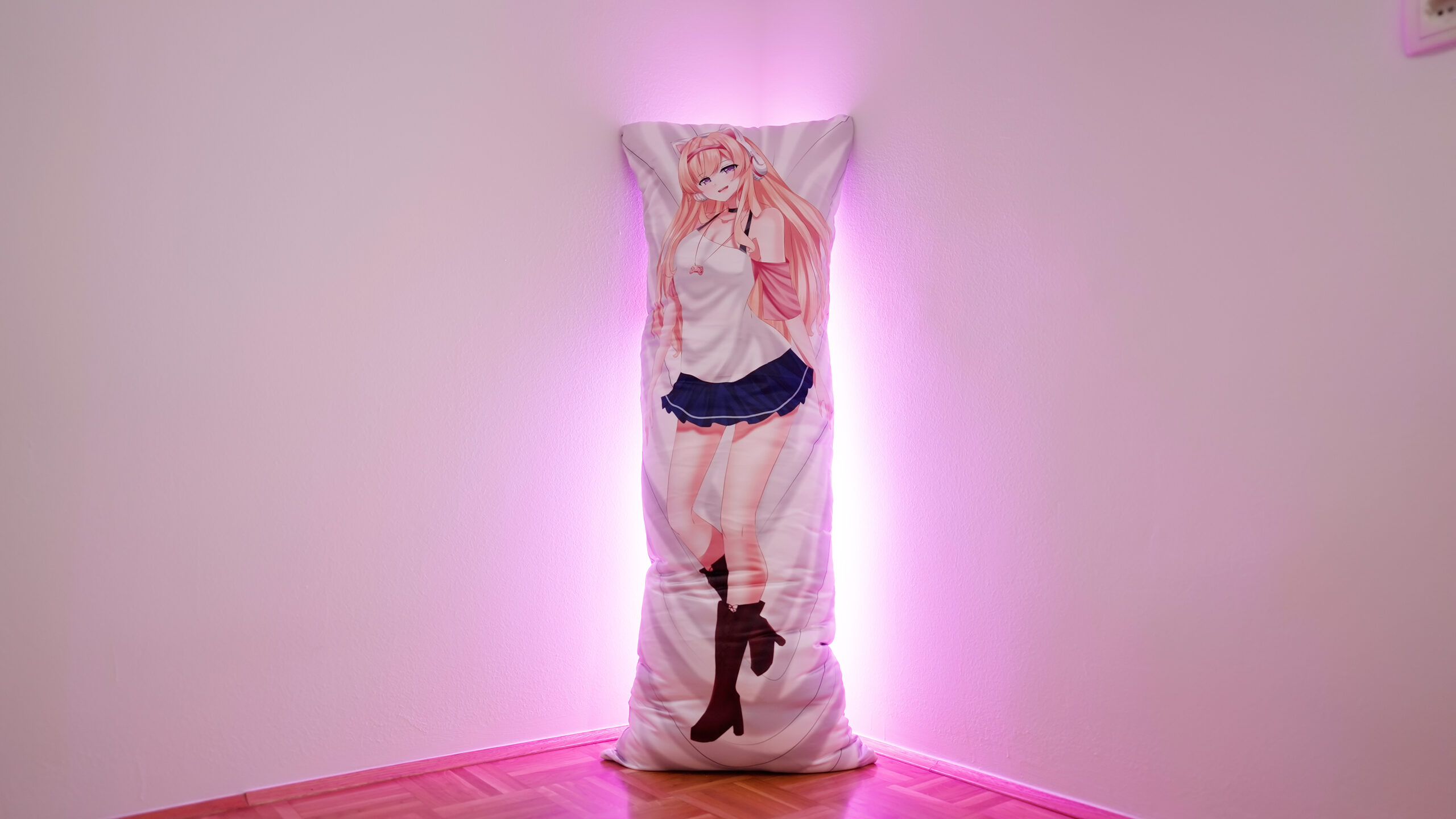 cute anime waifu body pillow standing in the corner of the room