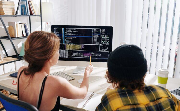 College students watching a webinar for their computer science subject