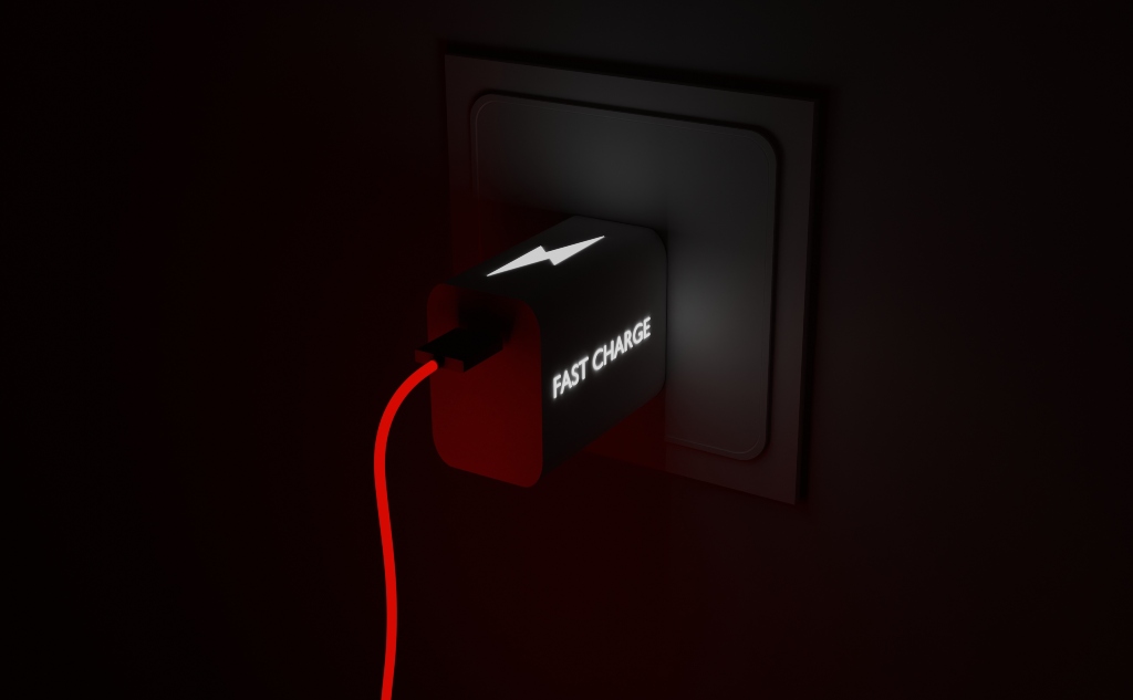black fast charger with red cord.