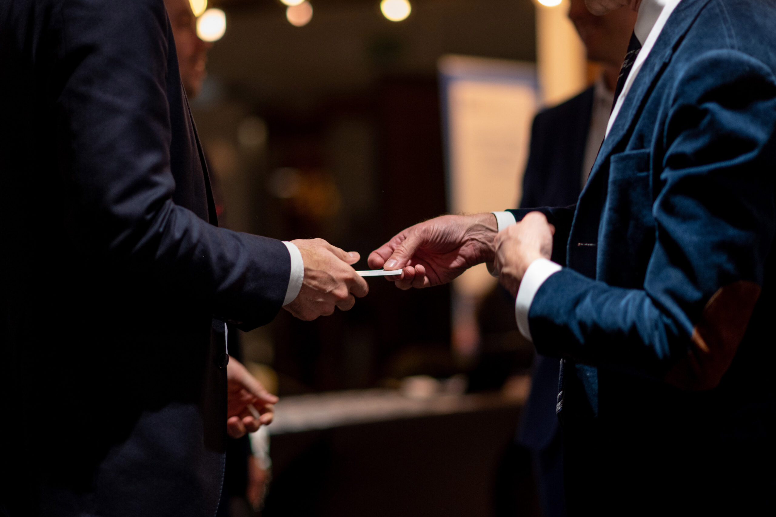 Men exchanging business cards