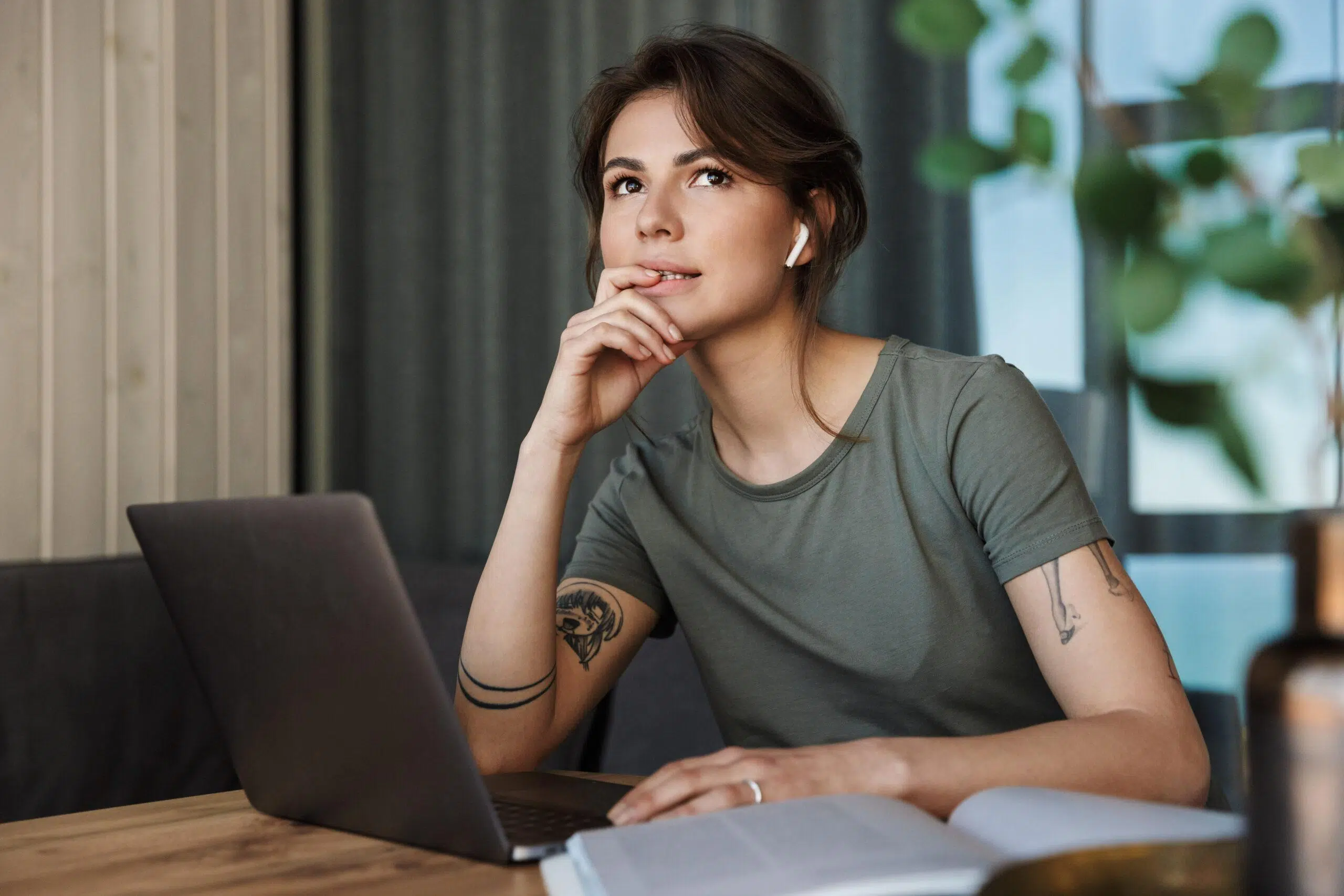 Attractive young woman working on laptop 