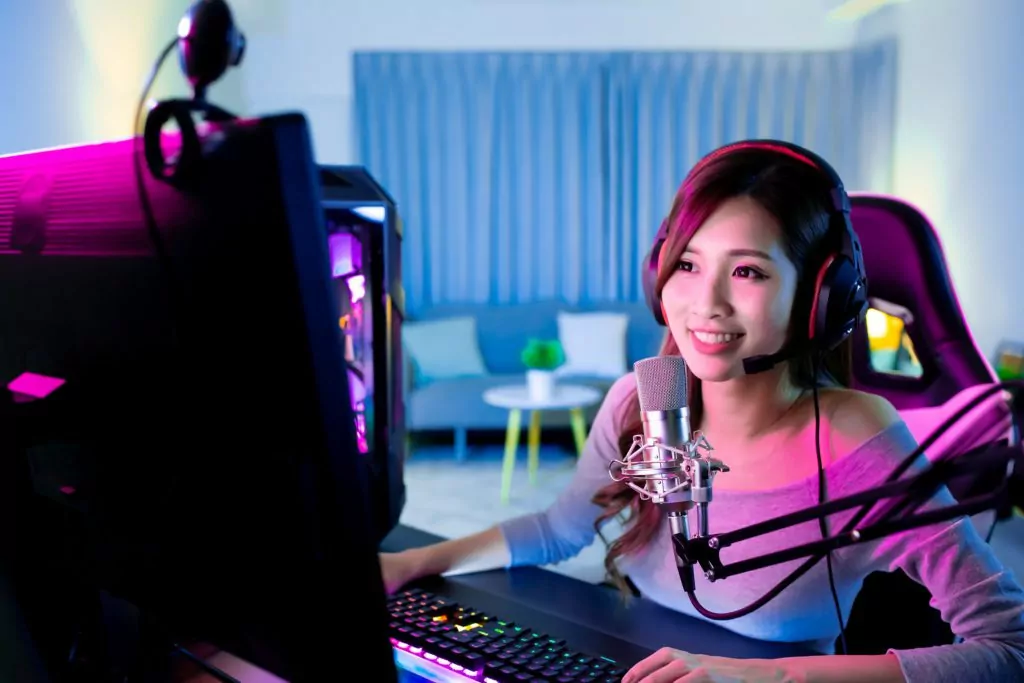 Girl cybersport gamer having a livestream.
