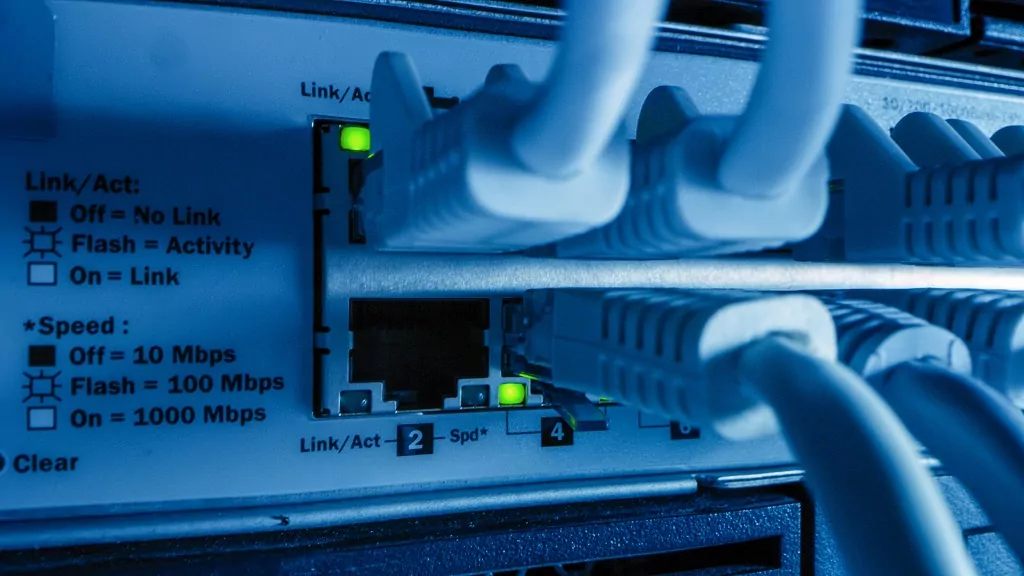 Ethernet cables connected to router ports.