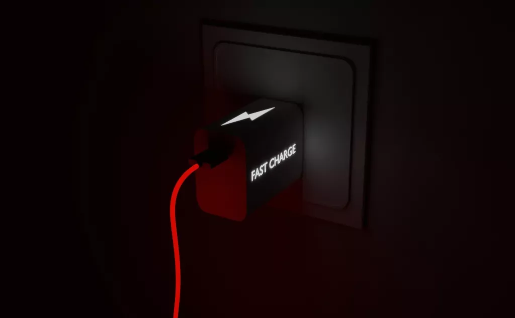 black fast charger with red cord.