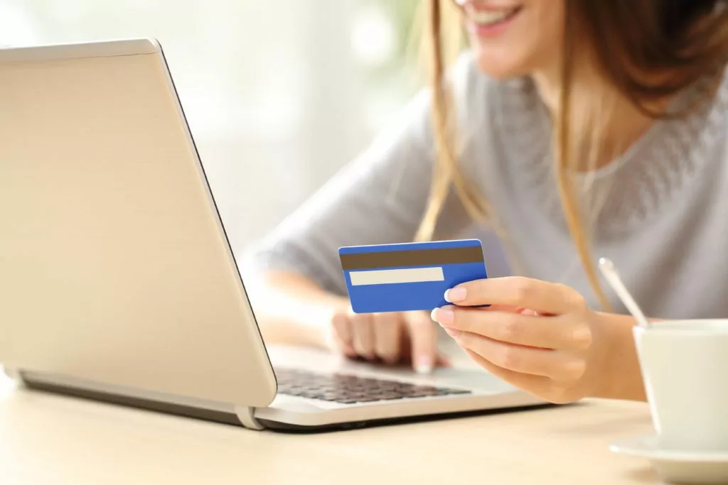 Woman buying online with her credit card.
